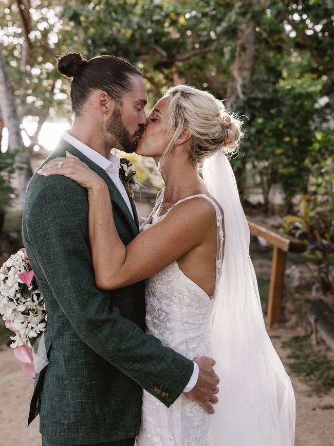 On their wedding day. Picture: Alex Marks Photography