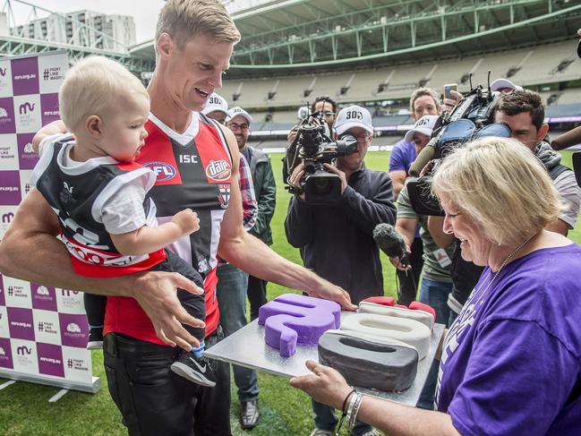 St Kilda captain Nick Riewoldt with son James and mum Fiona, at a press conference leading up to Nick’s 300th game and Maddie’s Match in 2016. Picture: Jason Edwards