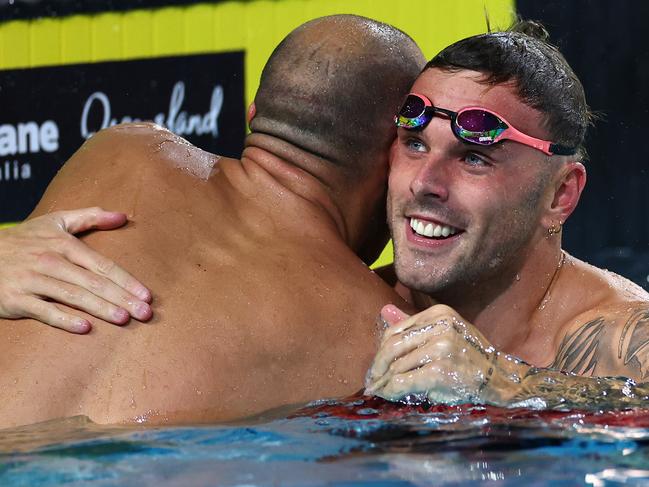 Kyle Chalmers congratulated post race. Picture: Quinn Rooney/Getty Images