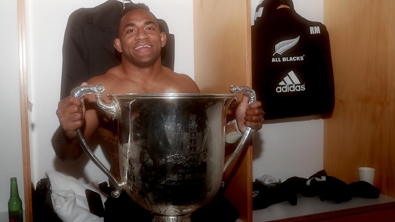 Sevu Reece of the All Blacks celebrates with the Bledisloe Cup at Eden Park.