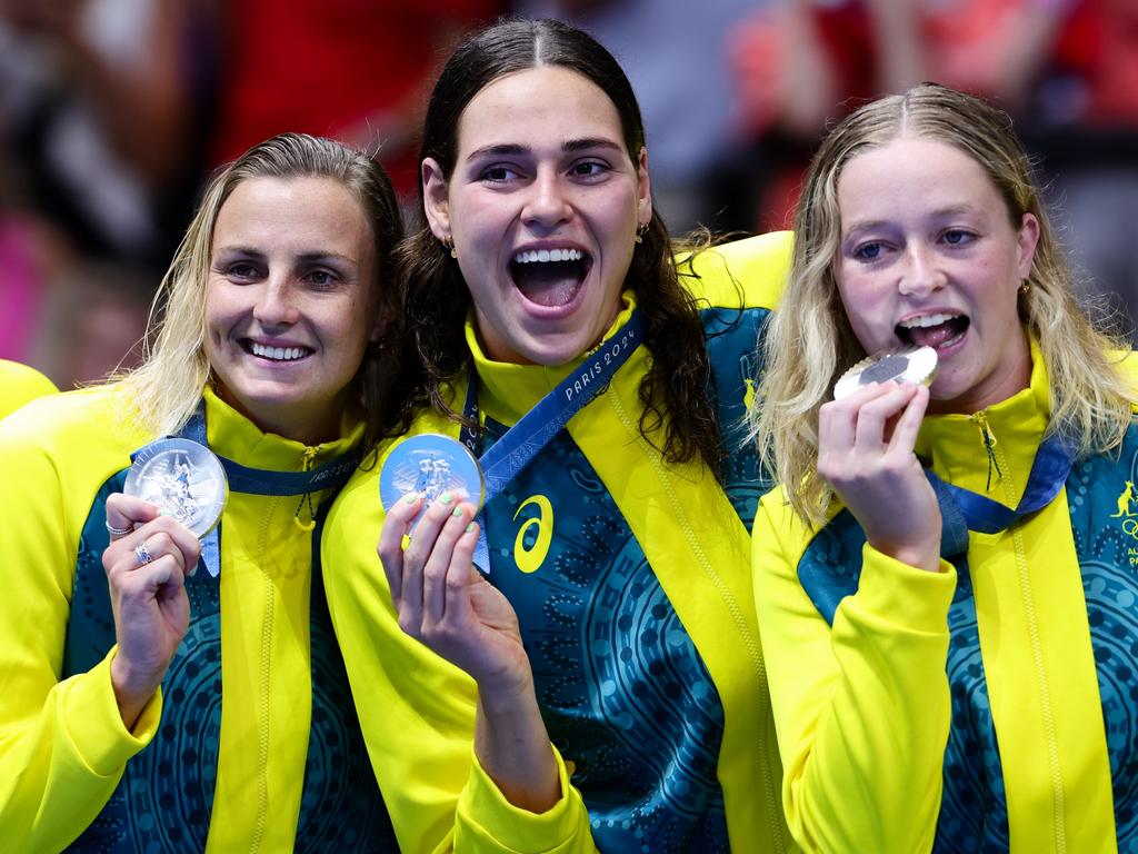 Australian players show off their hardware after the medal ceremony. Picture: Pete Dovgan/Speed Media/Icon Sportswire via Getty Images