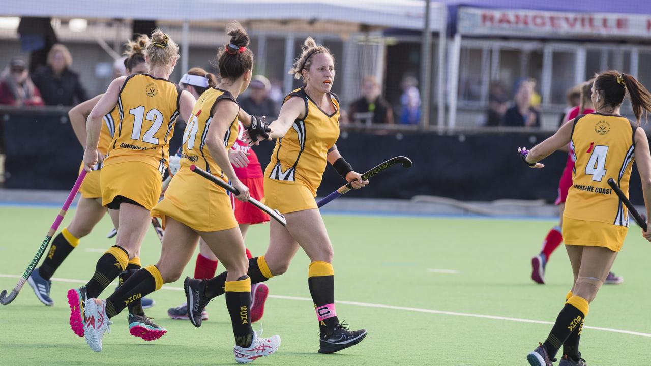 Sunshine Coast 1 celebrate a goal against Bundaberg 1.