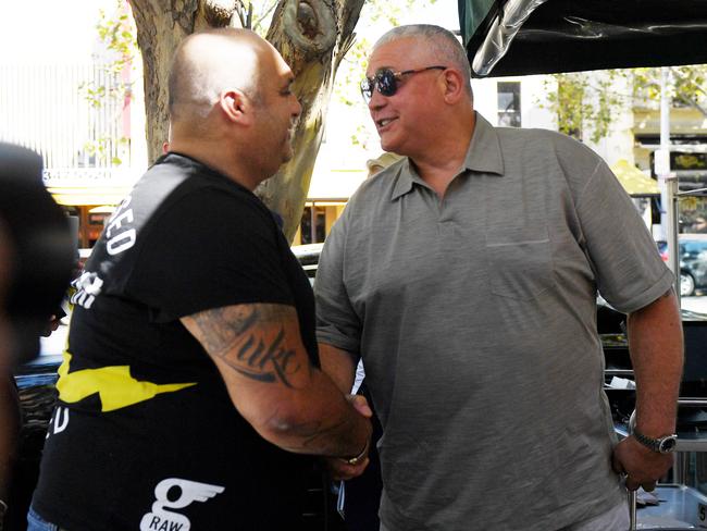 Gatto caught up with mate Angelo Venditti outside the cafe. AAP Image/Tracey Nearmy