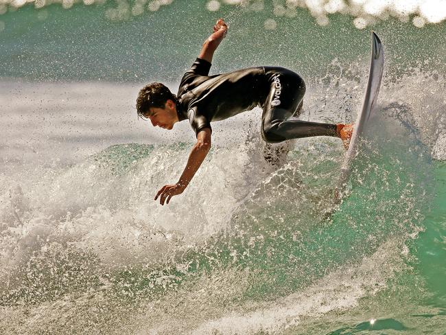 Local surfer Harley Ross-Webster in action at Curl Curl Beach. He is competing in annual Surf Aid Cup this Friday. Picture: Troy Snook