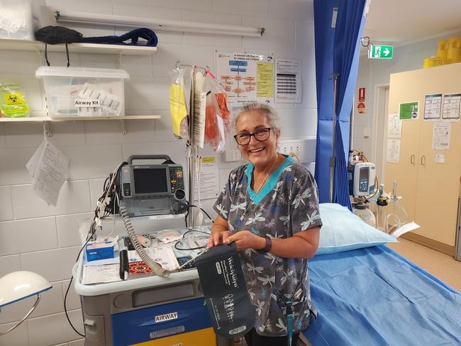 Nurse Sandra Higgs helped Paul in the back of the ambulance.