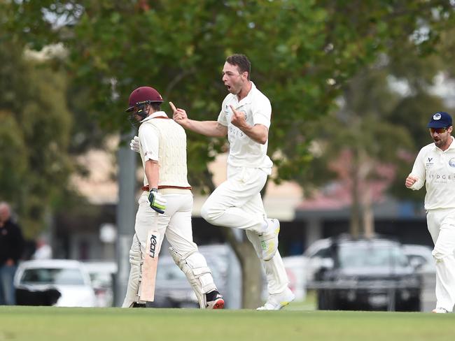 Celebrating a wicket with Geelong.