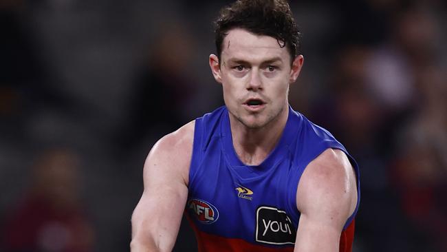 MELBOURNE, AUSTRALIA - AUGUST 12: Lachie Neale of the Lions runs with the ball during the round 22 AFL match between the St Kilda Saints and the Brisbane Lions at Marvel Stadium on August 12, 2022 in Melbourne, Australia. (Photo by Darrian Traynor/Getty Images)