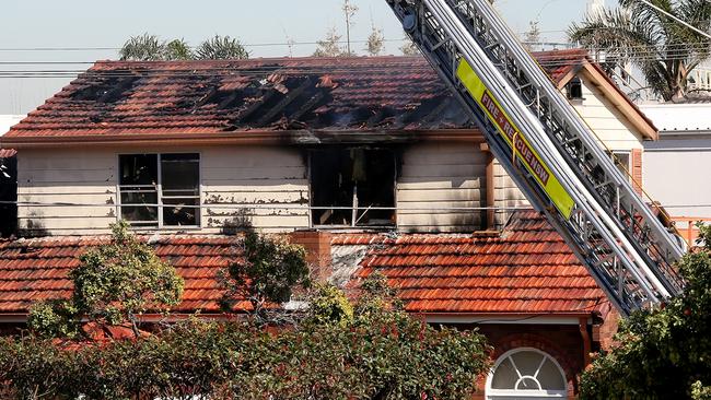 The red brick house sustained extensive damage. Picture: Noel Kessel