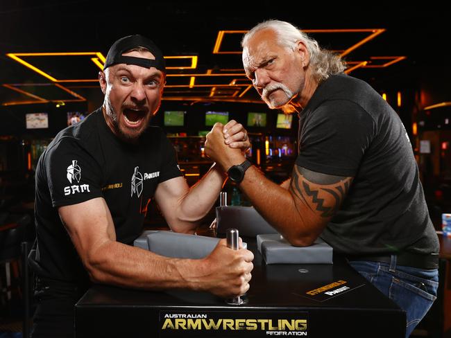 Arm wrestlers Sam Stewart and Charlie Andrijich at The Star. Picture: Richard Dobson