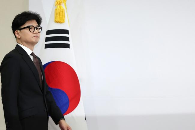 People Power Party leader Han Dong-hoon arrives for a press conference announcing his resignation at the National Assembly in Seoul on December 16, 2024