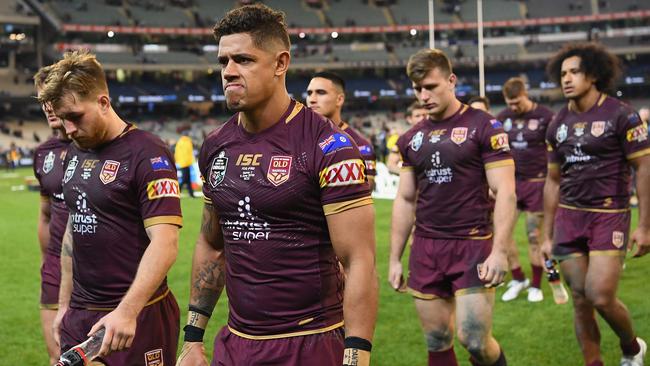 Queensland players depart the MCG. Picture: Getty Images