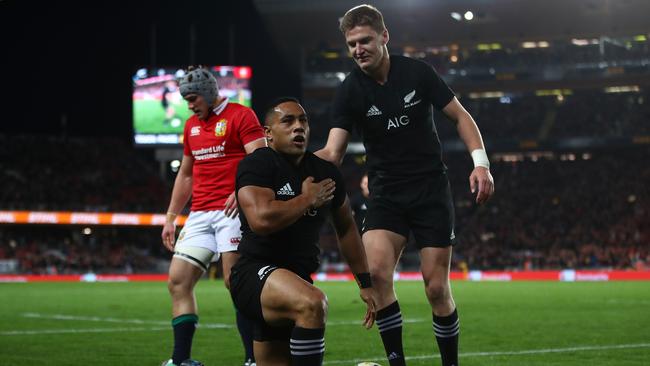 Ngani Laumape of the All Blacks is congratulated by Jordie Barrett after scoring the opening try.