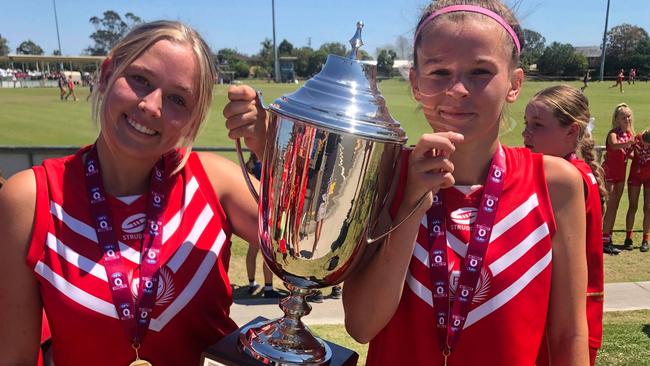 Palm Beach Currumbin SHS Junior Female team captains Lani Bourke and Mia Salisbury were ecstatic after their grand final win. Picture: Laura Pettigrew.