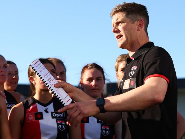 MELBOURNE, AUSTRALIA - SEPTEMBER 24: Saints AFLW Senior Coach Nick Dal Santo talks to his players during the round four AFLW match between St Kilda Saints and Collingwood Magpies at RSEA Park, on September 24, 2023, in Melbourne, Australia. (Photo by Graham Denholm/Getty Images)