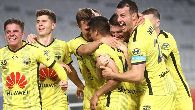 Wellington Phoenix players celebrate a goal to Ulises Davila. Picture: Getty Images