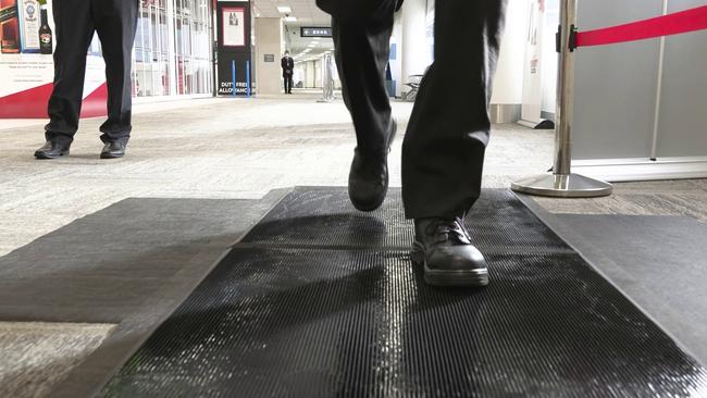 FMD mats in use at Perth Airport to help prevent the spread of foot-and-mouth disease.