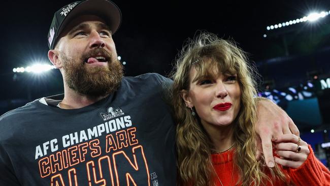 BALTIMORE, MARYLAND - JANUARY 28: Travis Kelce #87 of the Kansas City Chiefs (L) celebrates with Taylor Swift after defeating the Baltimore Ravens in the AFC Championship Game at M&T Bank Stadium on January 28, 2024 in Baltimore, Maryland.  (Photo by Patrick Smith/Getty Images)