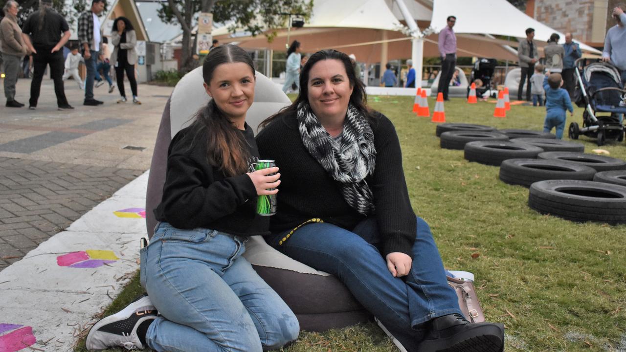 Families &amp; friends enjoy a Friday night out at the Unlock the Block event at Darcy Doyle Place, Ipswich, on August 12, 2022. Picture: Peta McEachern