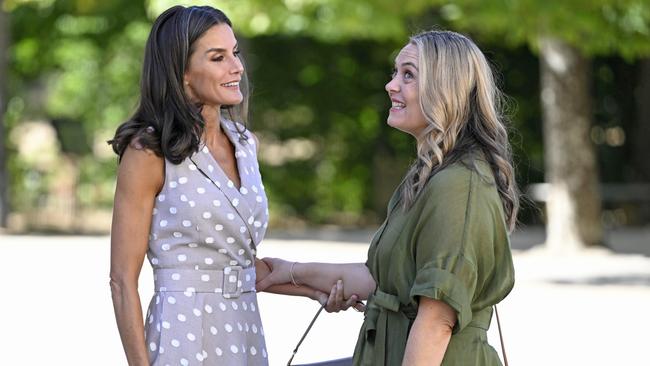 Queen Letizia of Spain greets Jodie Haydon at a Meeting With First Ladies during a NATO Summit on June 29. Picture: Carlos Alvarez/Getty Images