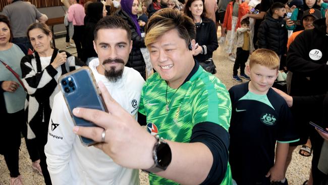 Melbourne-based Socceroo Jamie Maclaren meets supporters as he returns home to Melbourne Airport from the world cup in Qatar Picture: David Geraghty