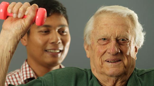 Denis Dowty is guided by Ivan Nuguid, Respiratory Nurse, during the Rehabilitation class at cabrini Rehabilitation Centre, Elsternwick Picture: Janine Eastgate