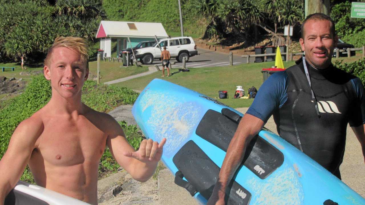 DETERMINED: Will Brighton and Todd Ives in Yamba during their 60km paddle from Woody Head to Wooli. Picture: Contributed