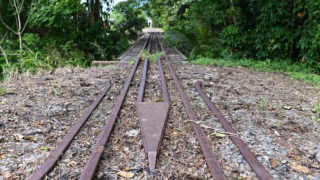 Locals fear children will use the adjacent rail bridge to cross Gordon Creek if the pedestrian bridge is closed. Picture: Isaac McCarthy