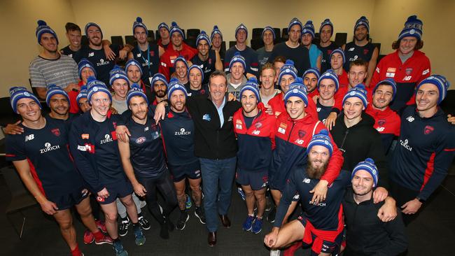 Neale Daniher with the entire Melbourne playing list at AAMI Park. Pic: Michael Klein