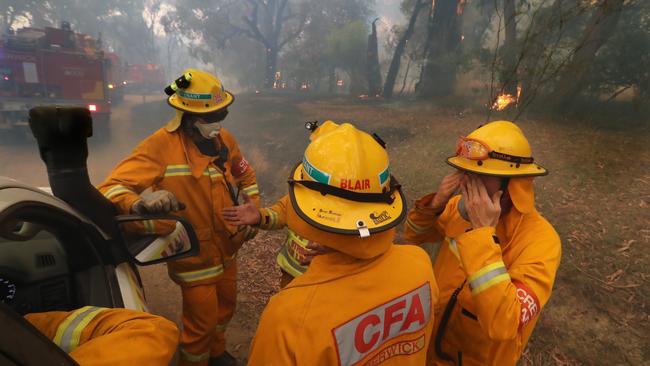 CFA members discuss their fire plan in Bunyip State Park. Picture: Alex Coppel