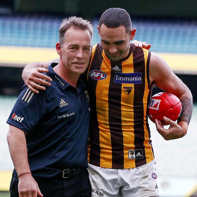 Alastair Clarkson and Shaun Burgoyne walk off the MCG after their last game in 2021.