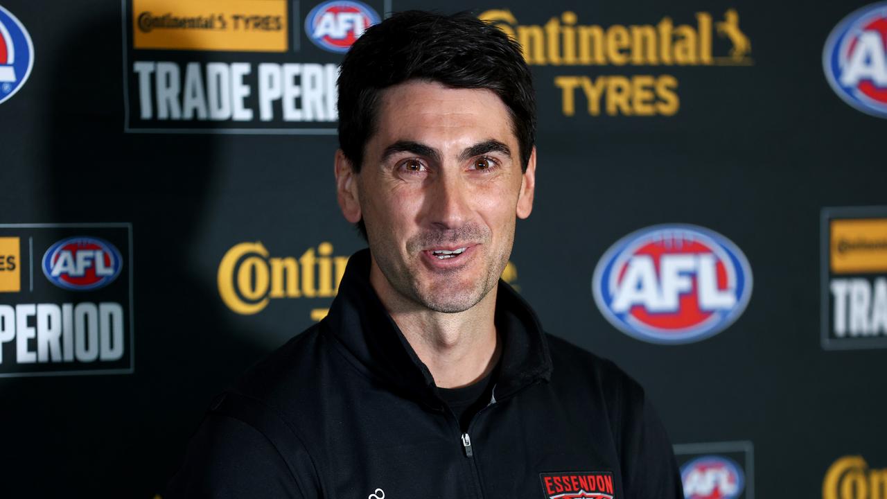 MELBOURNE, AUSTRALIA - OCTOBER 07: Matt Rosa, Essendon Talent &amp; Operations Manager speaks during the 2024 Continental Tyres AFL Trade Period at Marvel Stadium on October 07, 2024 in Melbourne, Australia. (Photo by Josh Chadwick/AFL Photos via Getty Images)