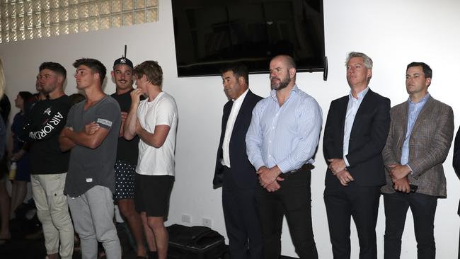 Adelaide football director Mark Ricciuto (in blue shirt) listens to Matthew Nicks’ introductory press conference as Crows coach with players and officials. Picture: Sarah Reed