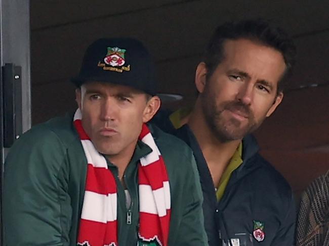 WREXHAM, WALES - MARCH 25: Wrexham owners Rob McElhenney watch the game with Ryan Reynolds and his wife Blake Lively during the Vanarama National League match between Wrexham and York City at the Racecourse Ground on March 25, 2023 in Wrexham, Wales. (Photo by Matthew Ashton - AMA/Getty Images)