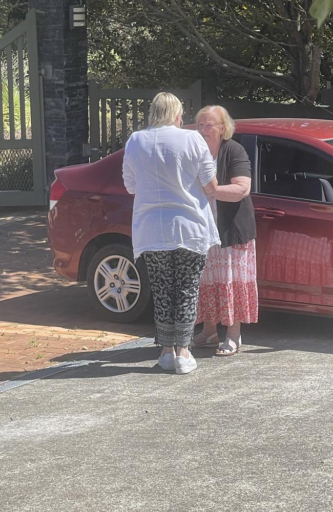 A neighbour comforts Alex’s mother. Picture: Sam Stolz