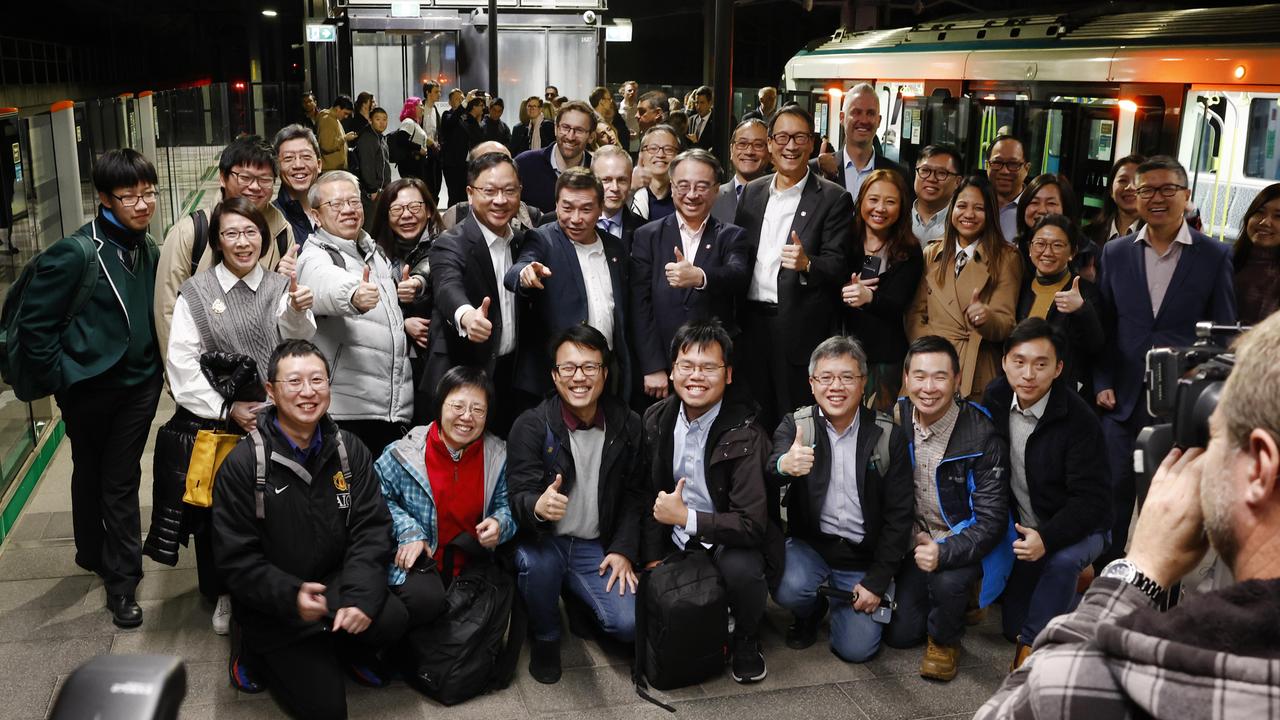 Pictured at Tallawong Station are MTR employees who developed system integration for the Sydney Metro and who were some of the first passengers on the brand new Sydney Metro on its maiden run to Tallawong which left Sydenham Station at 4.54am. Picture: Richard Dobson