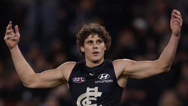 MELBOURNE, AUSTRALIA - JULY 21:  Charlie Curnow of the Blues celebrates a goal during the round 19 AFL match between Carlton Blues and North Melbourne Kangaroos at Marvel Stadium, on July 21, 2024, in Melbourne, Australia. (Photo by Darrian Traynor/Getty Images)