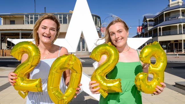 Friends and recent uni graduates Lilly Flannigan and Catherine White are brimming with excitement about the new year ahead. Picture: Brenton Edwards