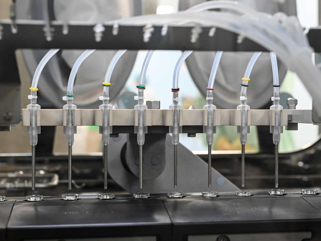 Researchers filling and packaging tests for the large-scale production and supply of the University of Oxford’s COVID-19 vaccine candidate. Picture: Vincenzo Pinto/AFP