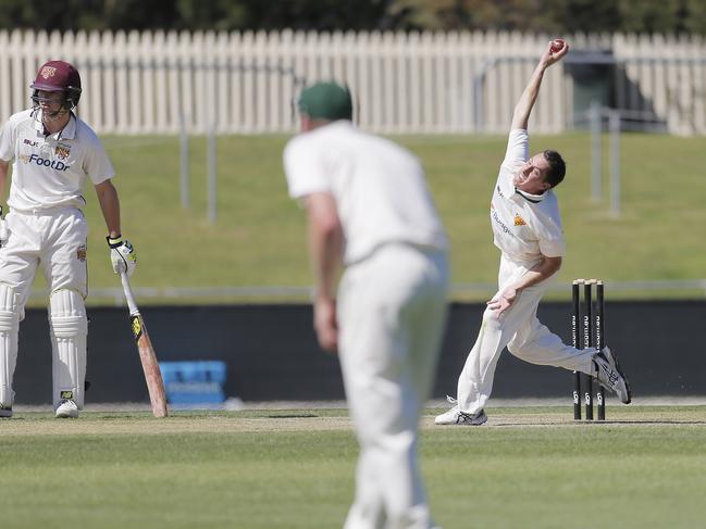 Andrew Perrin bowling for Tasmania.