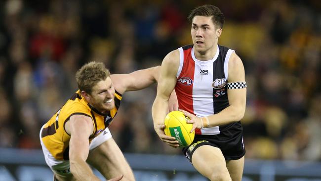 AFL Round 22. 18/08/2018. St Kilda vs Hawthorn at Etihad Stadium. St Kilda's Jade Gresham charges past Hawthorn's Ben McEvoy. Pic: Michael Klein