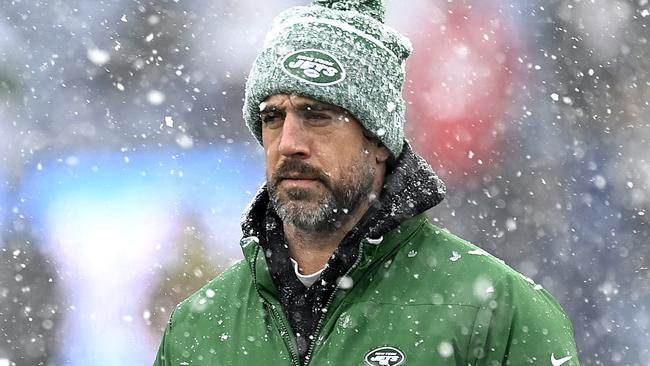 FOXBOROUGH, MASSACHUSETTS - JANUARY 07: Aaron Rodgers #8 of the New York Jets looks on before a game against the New England Patriots at Gillette Stadium on January 07, 2024 in Foxborough, Massachusetts. (Photo by Billie Weiss/Getty Images)