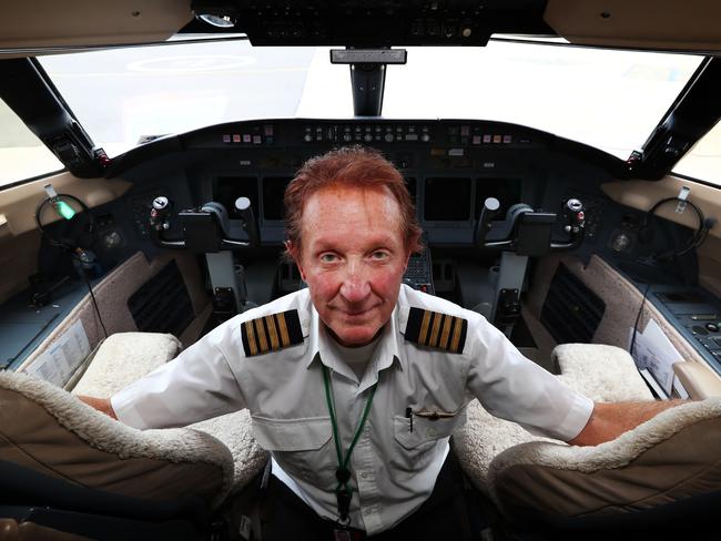 30/11/16: Byron Bailey demonstrating the key features in the cockpit of an aircraft which go to the argument about what happened to MH370. John Feder/The Australian.