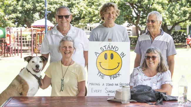 Embracing the sunshine are (back from left) Scout the dog, Greg Hamer, Kelly Campion, Mark, Leslie Smith and Mick in Laurel Bank Park. Picture: Nev Madsen.