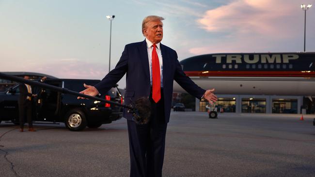 Donald Trump speaks to the media at Atlanta Hartsfield-Jackson International Airport after surrendering at the Fulton County jail on August 24, 2023 in Atlanta, Georgia. Picture: Joe Raedle/Getty Images/AFP