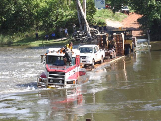 Three men spent a terrifying night stuck in the middle of the crocodile-infested river at Cahills Crossing in December 2011. They cowered in the cab of a prime mover, too fightened to risk wading back to the river bank.