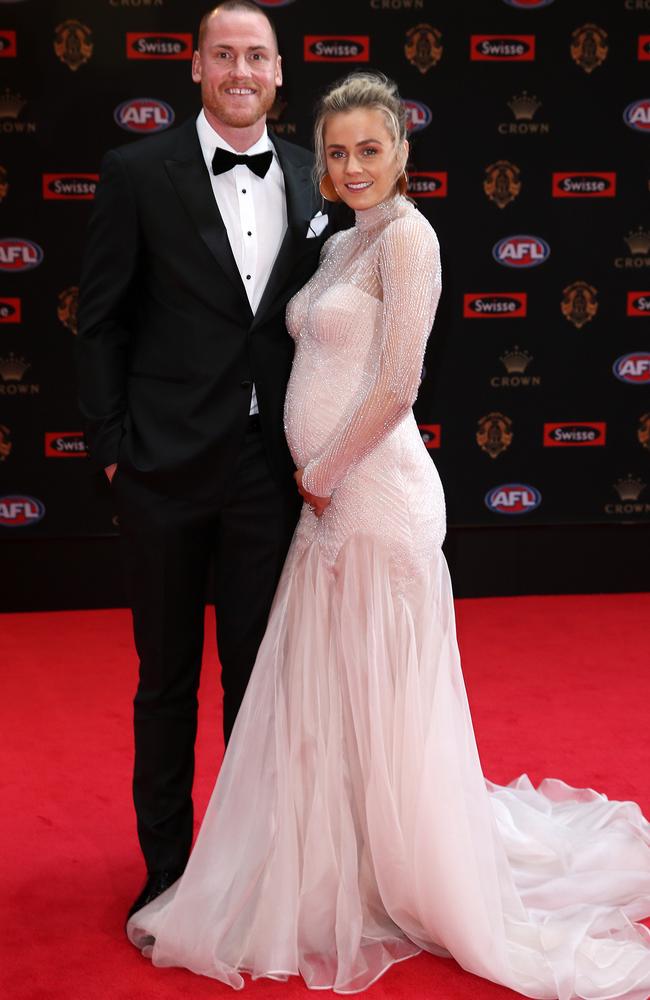 Jarryd Roughead and wife Sarah, showing off her baby bump for the first time. Picture: Michael Klein