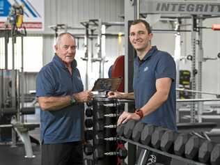 HIGH PERFORMANCE: Technology plays a key role in measuring and developing athletic development, according to The Fit Lab high performance coach Steve Nance (left) and fitness manager and high performance coach Corey Wolsk. Picture: Kevin Farmer