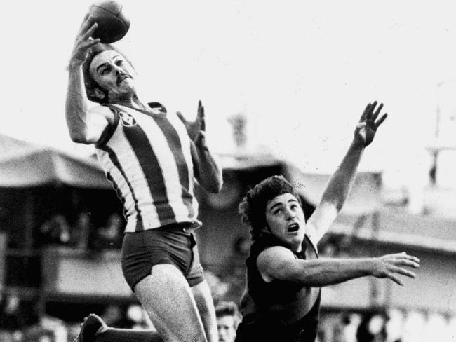 Malcolm Blight marks over Essendon’s Ken Roberts.