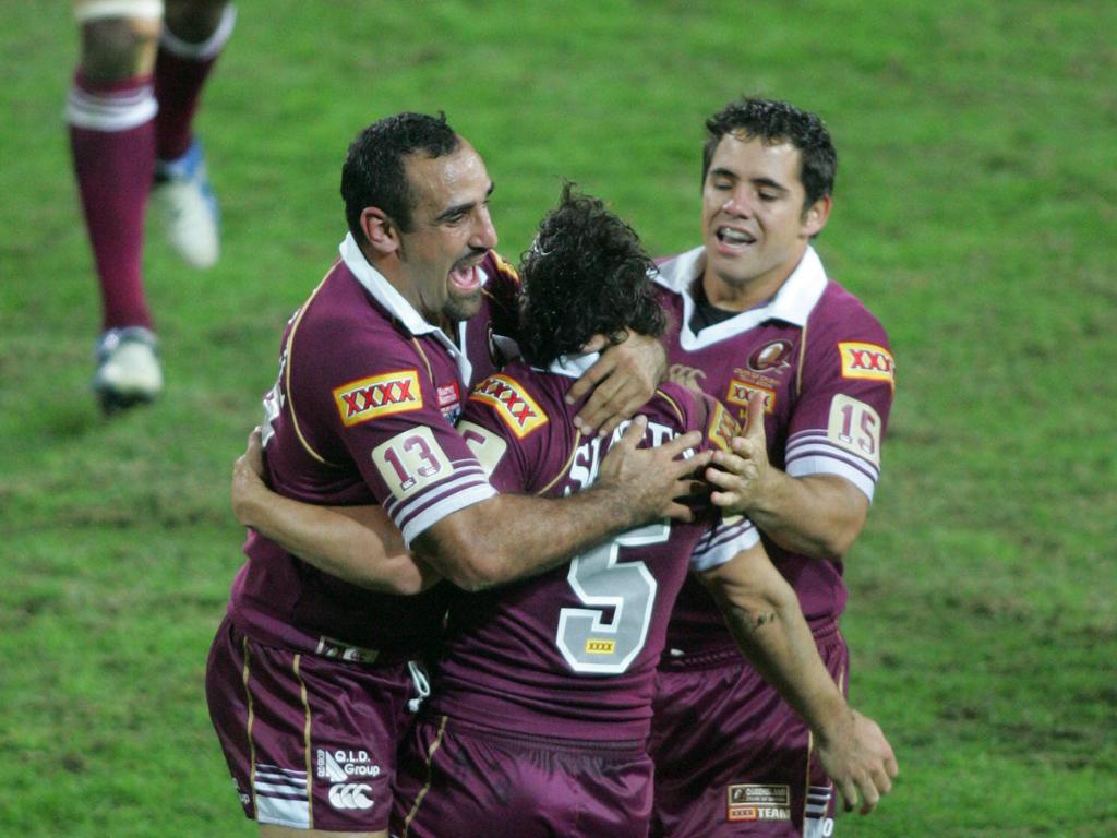 Billy Slater scores in 2004.