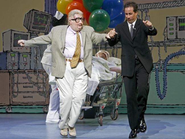 Short reprising the role of his character Jiminy Glick with Jerry Seinfeld during his musical comedy 'Martin Short: Fame Becomes Me', in 2006. 